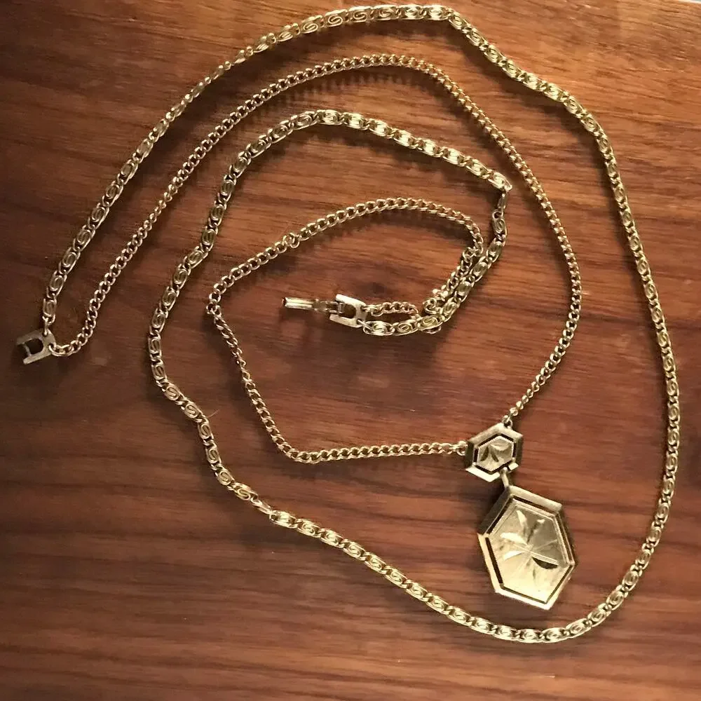 Vintage gold tone two-strand necklace, starburst design pendant